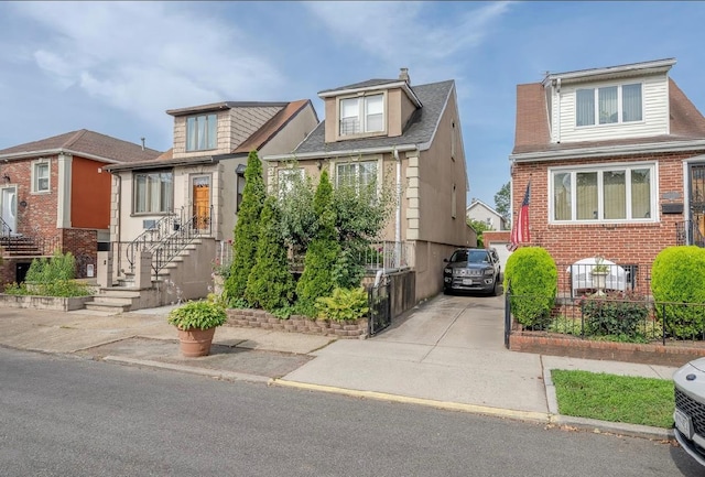 2144 73rd St, Astoria, NY 11370 - view of front of home with brick siding and concrete driveway