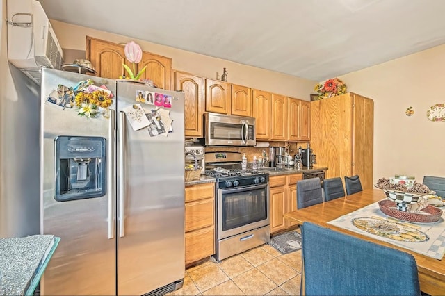 2144 73rd St, Astoria, NY 11370 - kitchen with stainless steel appliances, light tile patterned floors, and decorative backsplash