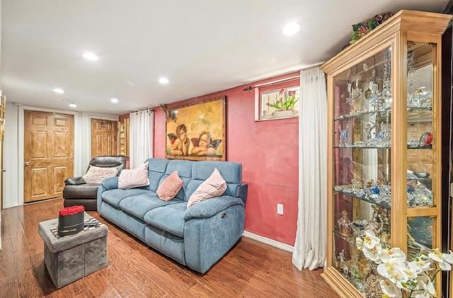 2144 73rd St, Astoria, NY 11370 - living room featuring wood finished floors and recessed lighting