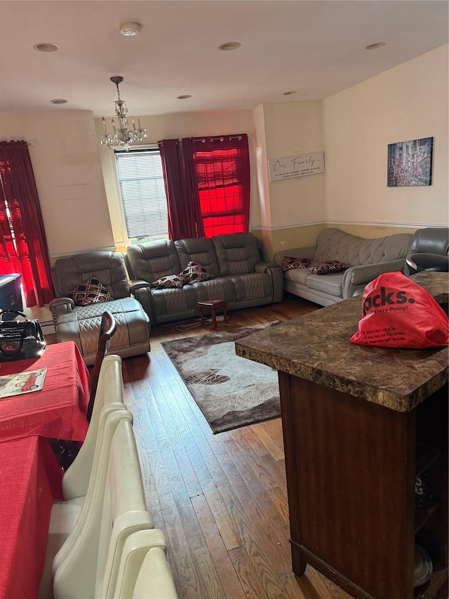 1380 Bristow St, Bronx, NY 10459 - living room with hardwood / wood-style floors and a chandelier
