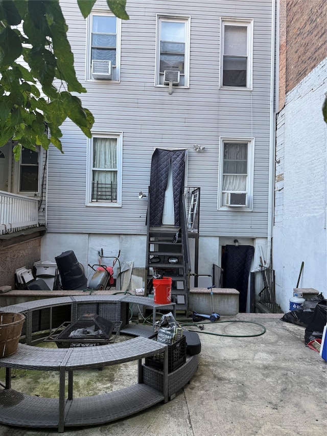 1380 Bristow St, Bronx, NY 10459 - view of patio with an outdoor fire pit and cooling unit