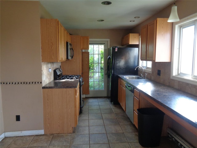31 Marine Ave W, Lindenhurst, NY 11757 - kitchen featuring black appliances, decorative backsplash, dark countertops, light tile patterned flooring, and recessed lighting