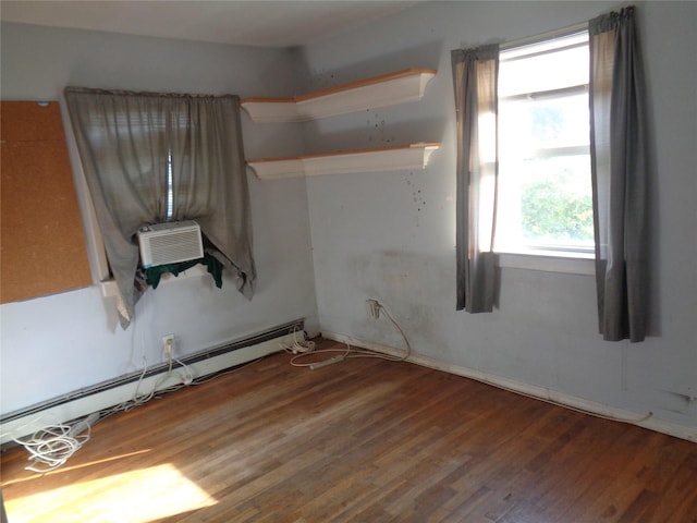 31 Marine Ave W, Lindenhurst, NY 11757 - unfurnished room with a baseboard heating unit, wood finished floors, and cooling unit