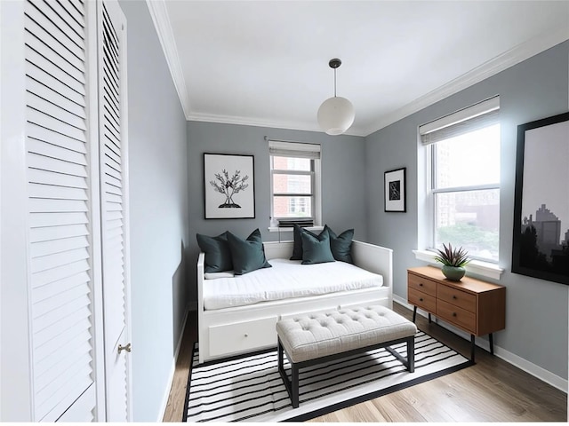 800 Grand Concourse Unit 2Js, Bronx, NY 10451 - bedroom featuring ornamental molding and wood finished floors