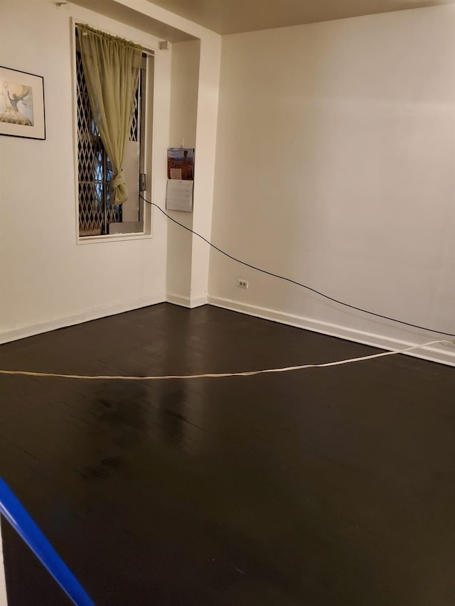 14018 Burden Cres Unit 410, Briarwood, NY 11435 - empty room featuring baseboards