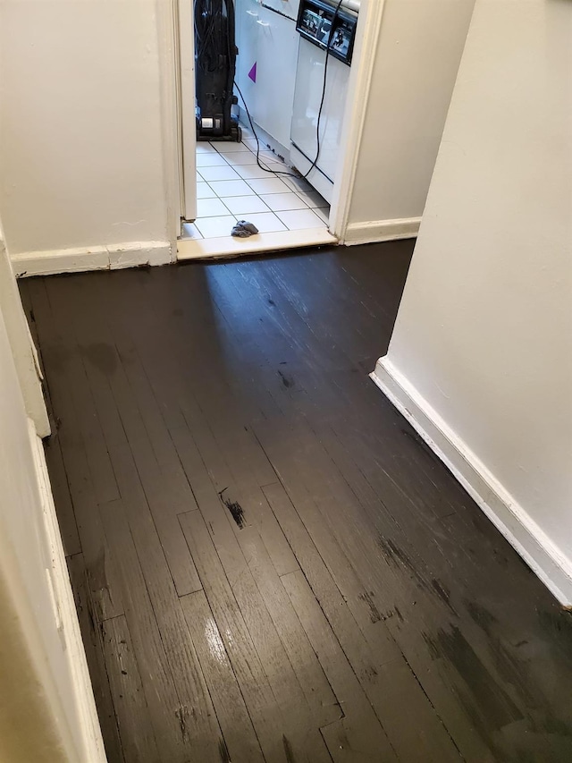 14018 Burden Cres Unit 410, Briarwood, NY 11435 - detailed view of wood finished floors and washer / clothes dryer