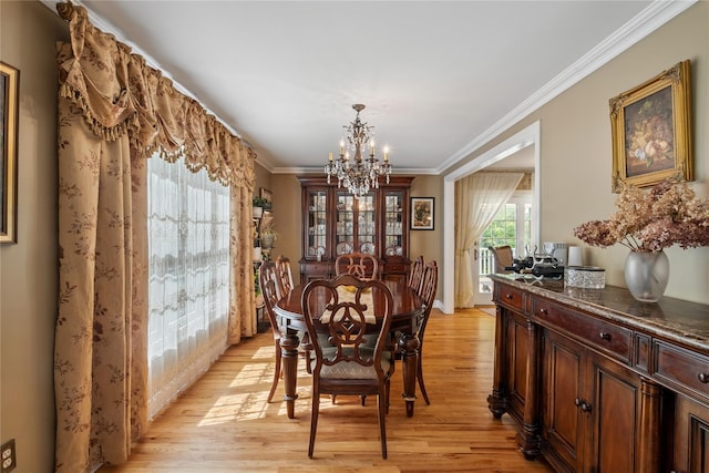 150 Hortontown Rd, Carmel, NY 10512 - dining space with a chandelier, light wood-type flooring, and ornamental molding