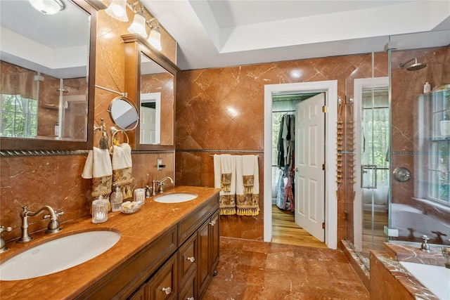 150 Hortontown Rd, Carmel, NY 10512 - bathroom with tile walls, a shower stall, plenty of natural light, double vanity, and a bath