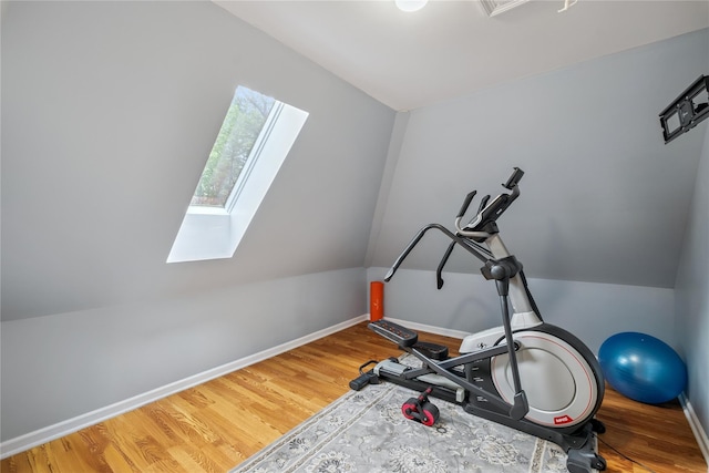 150 Hortontown Rd, Carmel, NY 10512 - workout area featuring a skylight, lofted ceiling, and wood finished floors