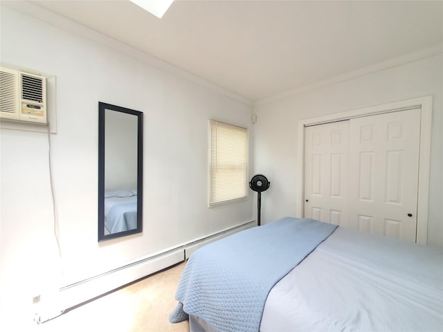 1336 Coates Ave, Holbrook, NY 11741 - bedroom with ornamental molding, a wall unit AC, a closet, and baseboard heating