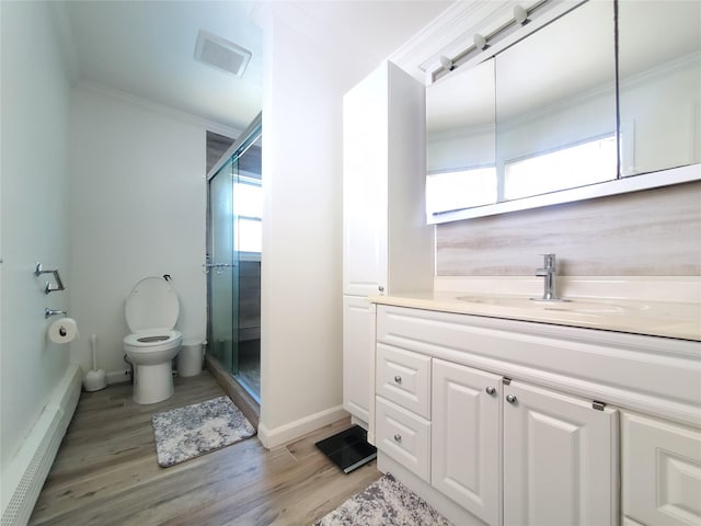1336 Coates Ave, Holbrook, NY 11741 - bathroom featuring vanity, a stall shower, healthy amount of natural light, crown molding, and baseboard heating