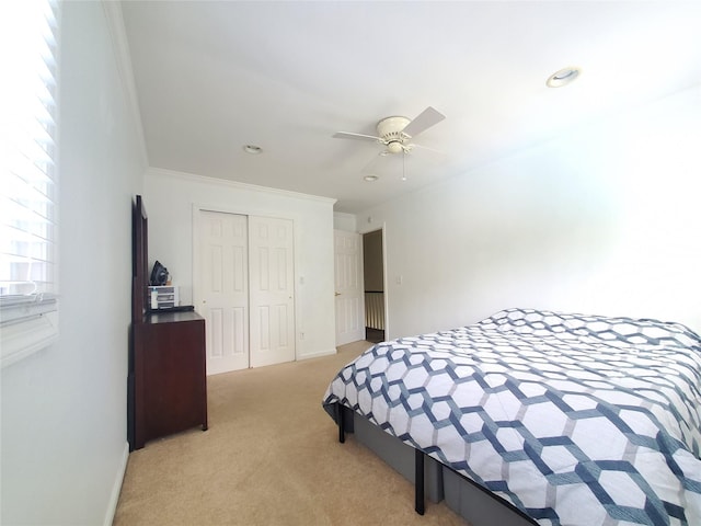 1336 Coates Ave, Holbrook, NY 11741 - bedroom with light colored carpet, a closet, crown molding, recessed lighting, and ceiling fan