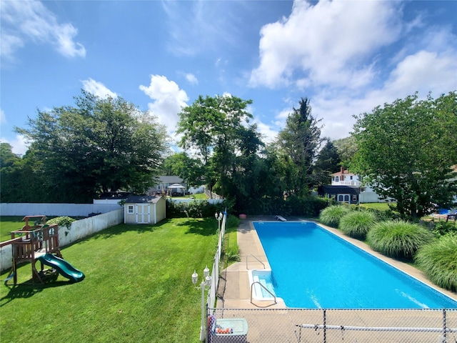 1336 Coates Ave, Holbrook, NY 11741 - view of pool featuring a storage shed and a playground