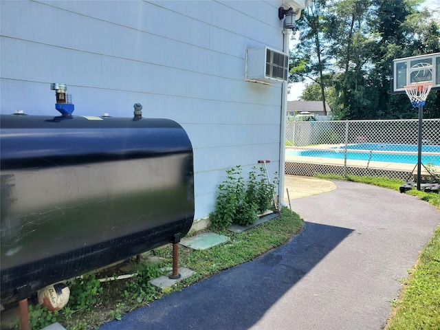 1336 Coates Ave, Holbrook, NY 11741 - exterior space featuring heating fuel and a pool