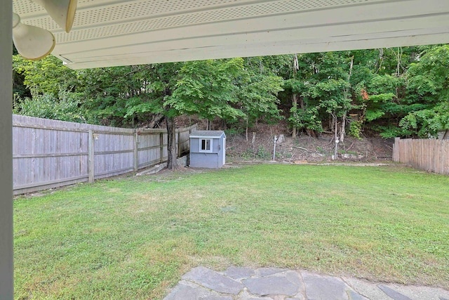 58 Wawayanda Ave, Middletown, NY 10940 - fenced backyard featuring a storage unit