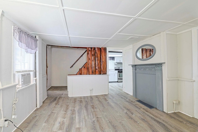 58 Wawayanda Ave, Middletown, NY 10940 - kitchen featuring stainless steel gas range, wood finished floors, and cooling unit