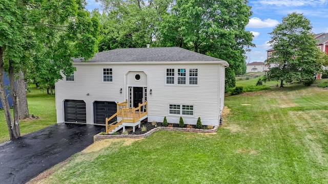 30 Wilson St, Middletown, NY 10940 - bi-level home with an attached garage, driveway, a front yard, and roof with shingles