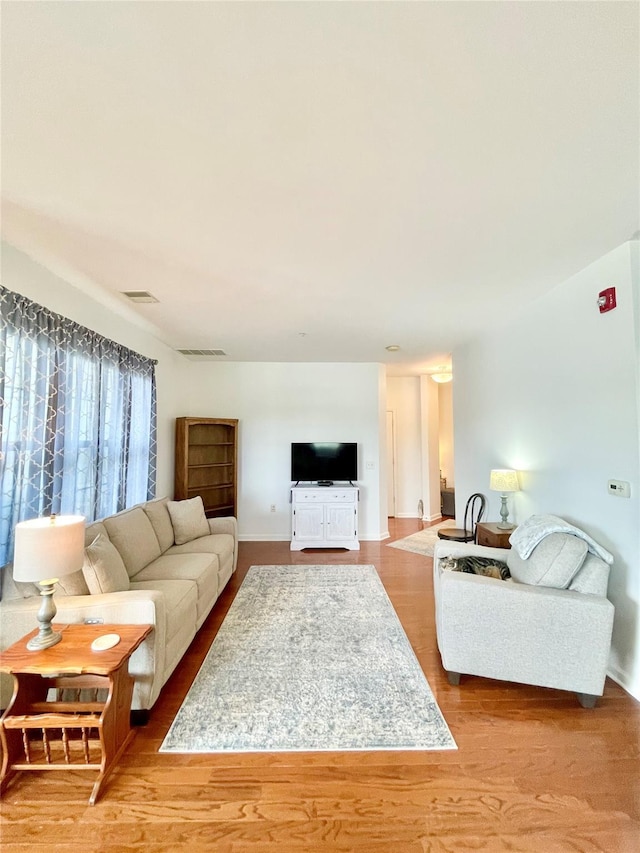 936 Tower Ridge Cir, Middletown, NY 10941 - living area featuring wood finished floors and baseboards
