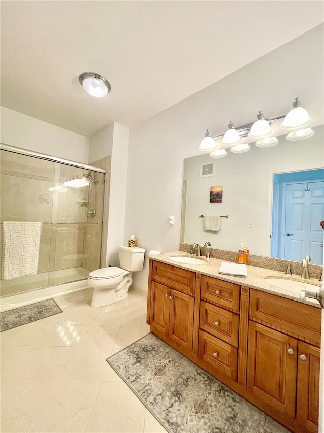 936 Tower Ridge Cir, Middletown, NY 10941 - bathroom with double vanity, a stall shower, and tile patterned floors
