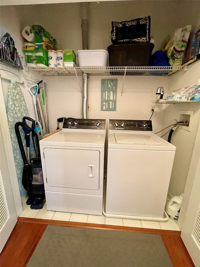 936 Tower Ridge Cir, Middletown, NY 10941 - washroom featuring washer and dryer and wood finished floors