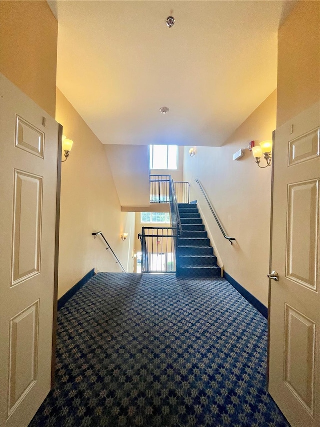 936 Tower Ridge Cir, Middletown, NY 10941 - staircase featuring carpet floors and vaulted ceiling
