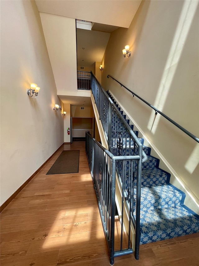 936 Tower Ridge Cir, Middletown, NY 10941 - stairs featuring wood finished floors and a towering ceiling