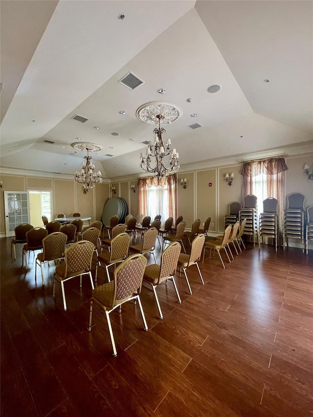 936 Tower Ridge Cir, Middletown, NY 10941 - dining room with a chandelier, wood finished floors, healthy amount of natural light, a tray ceiling, and crown molding