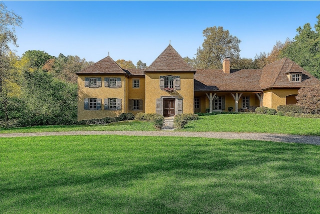 41 Linden Ln, Bedford Corners, NY 10549 - french country inspired facade featuring a front yard, a chimney, and stucco siding