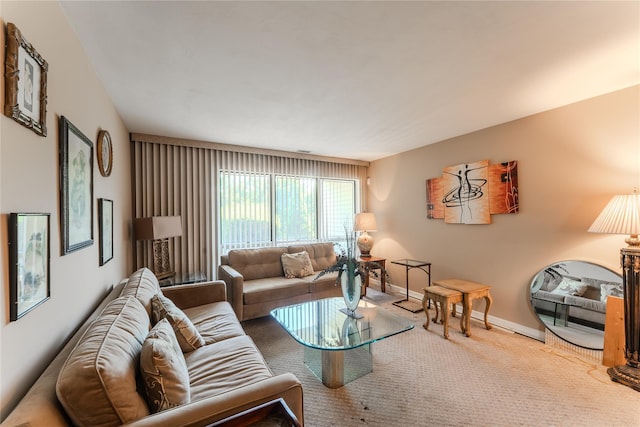 100 Baker Ct Unit 128, Island Park, NY 11558 - carpeted living area featuring baseboards