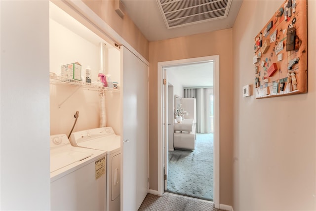 100 Baker Ct Unit 128, Island Park, NY 11558 - laundry area featuring independent washer and dryer and carpet floors
