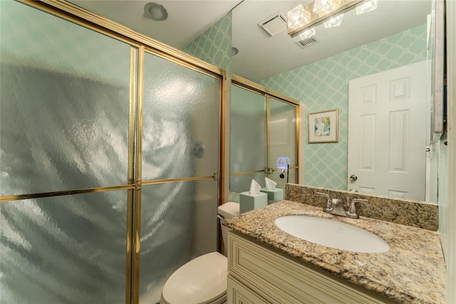 100 Baker Ct Unit 128, Island Park, NY 11558 - bathroom with wallpapered walls, vanity, and an enclosed shower