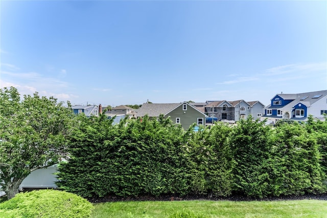 100 Baker Ct Unit 128, Island Park, NY 11558 - view of yard with a residential view