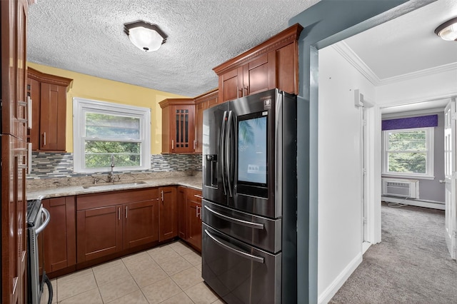 2710 S Rd Unit A4, Poughkeepsie, NY 12601 - kitchen featuring stainless steel appliances, light stone countertops, tasteful backsplash, glass insert cabinets, and ornamental molding