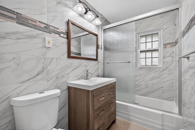 2710 S Rd Unit A4, Poughkeepsie, NY 12601 - bathroom with vanity, bath / shower combo with glass door, and tile walls