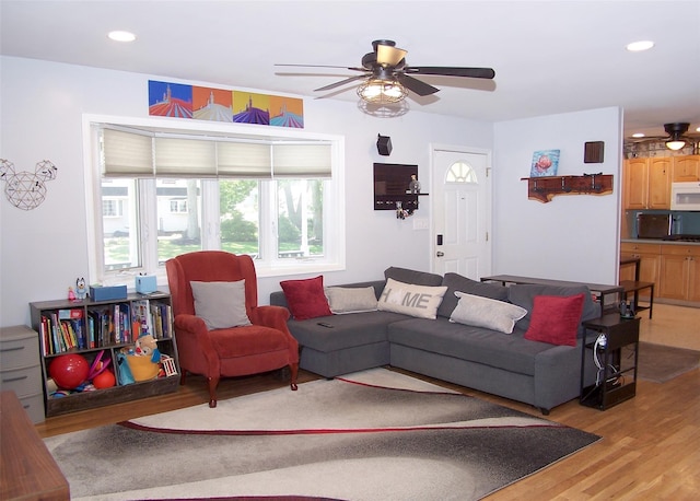 73 Peconic St, Selden, NY 11784 - living room featuring light wood-type flooring, a ceiling fan, and recessed lighting