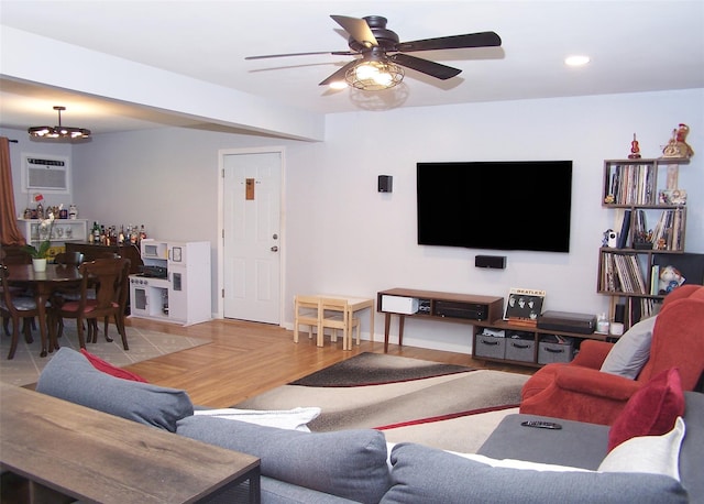 73 Peconic St, Selden, NY 11784 - living area featuring an AC wall unit, a ceiling fan, recessed lighting, and wood finished floors