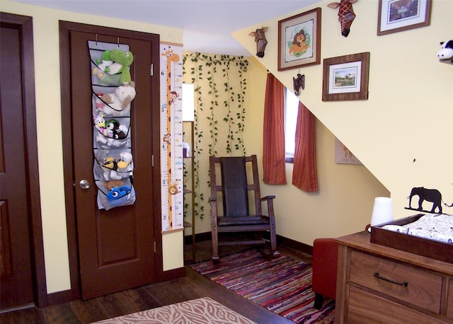 73 Peconic St, Selden, NY 11784 - foyer entrance featuring wood finished floors and baseboards