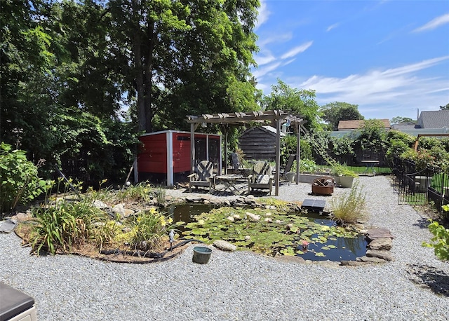 73 Peconic St, Selden, NY 11784 - view of yard with a pergola, a small pond, and a patio area