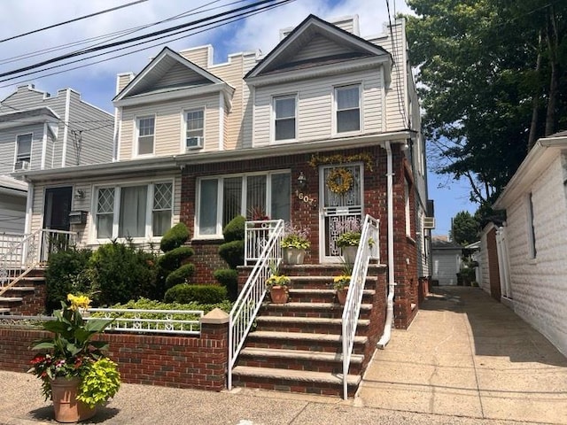 1607 E 43rd St, Brooklyn, NY 11234 - traditional-style house featuring a porch and brick siding