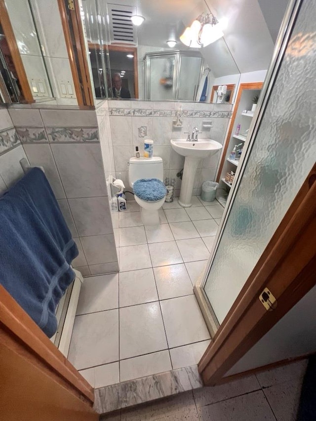 1607 E 43rd St, Brooklyn, NY 11234 - full bath featuring a stall shower, tile walls, and tile patterned floors