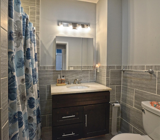 5822 Penrod St, Corona, NY 11368 - full bath featuring tile walls, vanity, wainscoting, and a shower with shower curtain