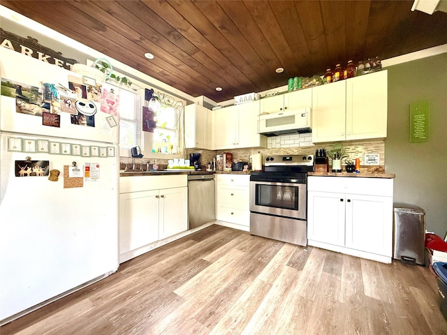 61 Cottage St, Roscoe, NY 12776 - kitchen featuring wooden ceiling, appliances with stainless steel finishes, light wood-style flooring, backsplash, and dark countertops