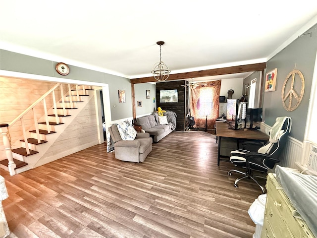 61 Cottage St, Roscoe, NY 12776 - living area with stairway, wood finished floors, wainscoting, and a chandelier