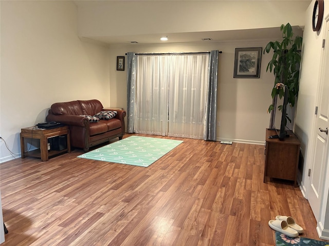 132 Weatherby Ln Unit 132, Central Islip, NY 11722 - living room featuring wood finished floors and baseboards