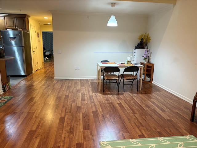 132 Weatherby Ln Unit 132, Central Islip, NY 11722 - dining space featuring crown molding, dark wood finished floors, and an office area