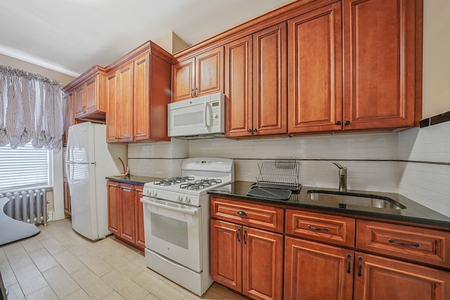 65 Granite St, Brooklyn, NY 11207 - kitchen featuring white appliances, radiator heating unit, decorative backsplash, and dark stone countertops
