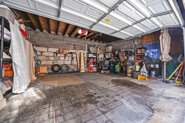65 Granite St, Brooklyn, NY 11207 - garage featuring concrete block wall