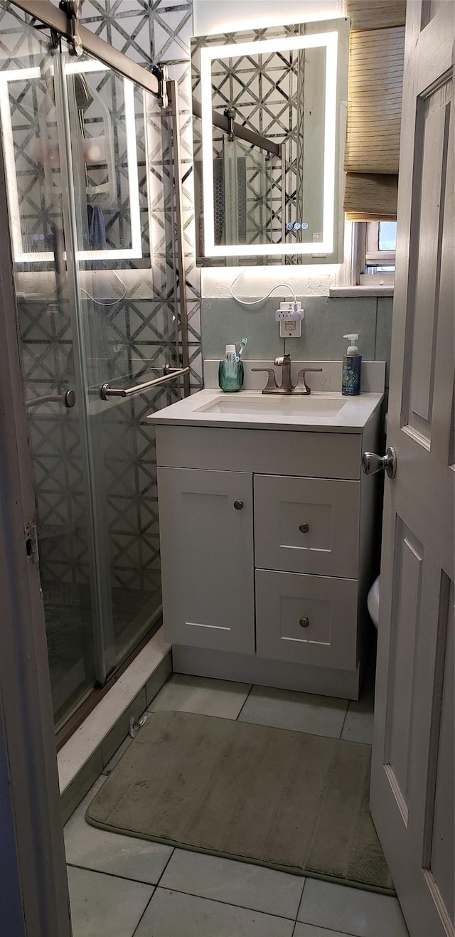 269 Windsor Pkwy, Hempstead, NY 11550 - bathroom featuring vanity and tile patterned flooring