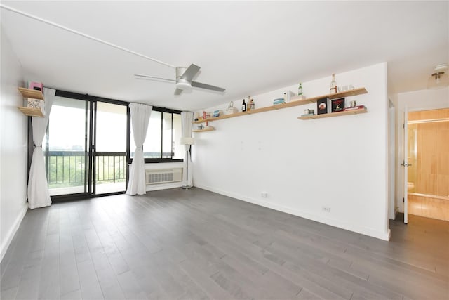 152-18 Union Tpke Unit 12T, Flushing, NY 11367 - unfurnished living room with dark wood-style flooring and a ceiling fan