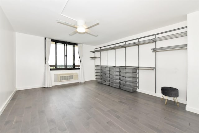 152-18 Union Tpke Unit 12T, Flushing, NY 11367 - unfurnished living room with a ceiling fan, wood finished floors, and a wall mounted AC